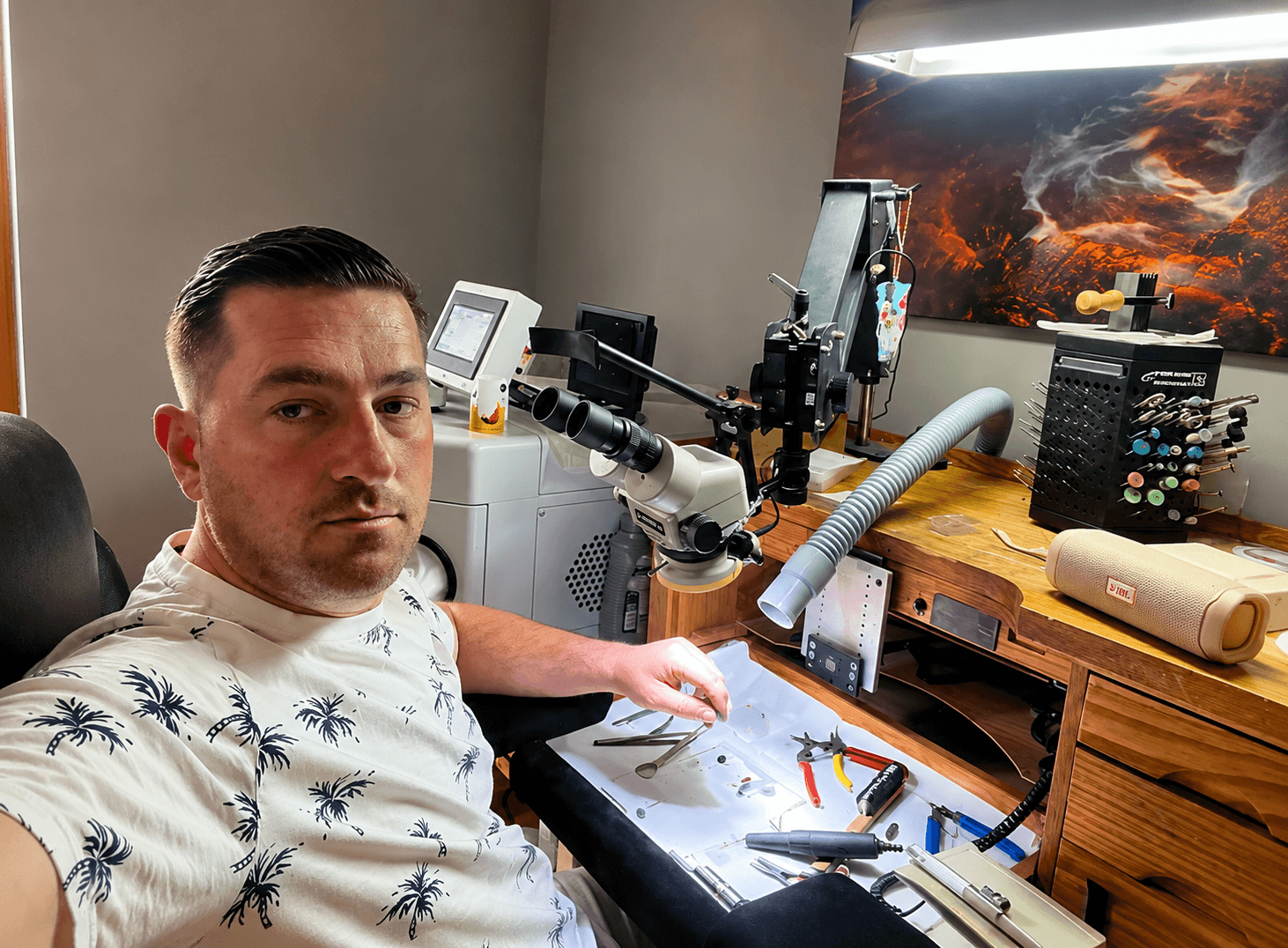 Gjon crafting fine jewelry at his workbench