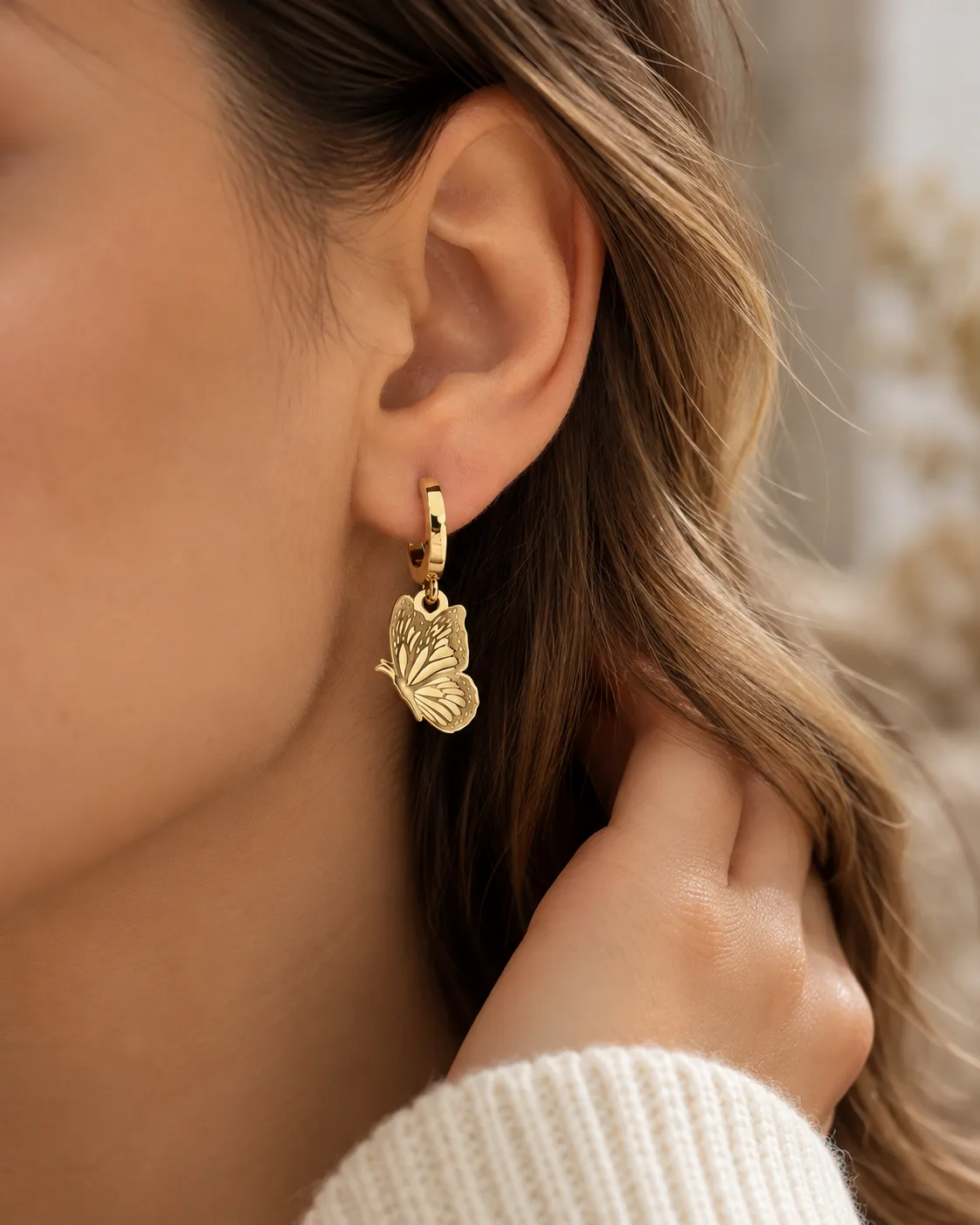 Butterfly huggie hoop earrings